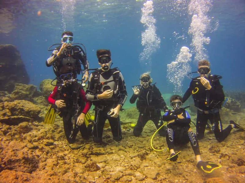 Athens: Discover Scuba Diving Experience for Beginners - Entering the open water near Athens