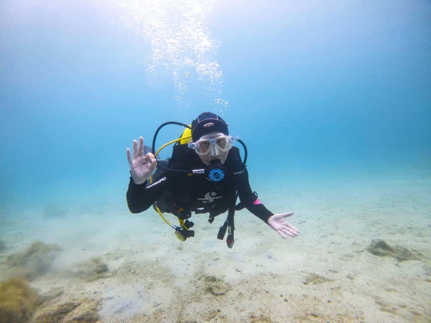 Athens: Try Scuba Diving - Leaving the surface near Vouliagmeni