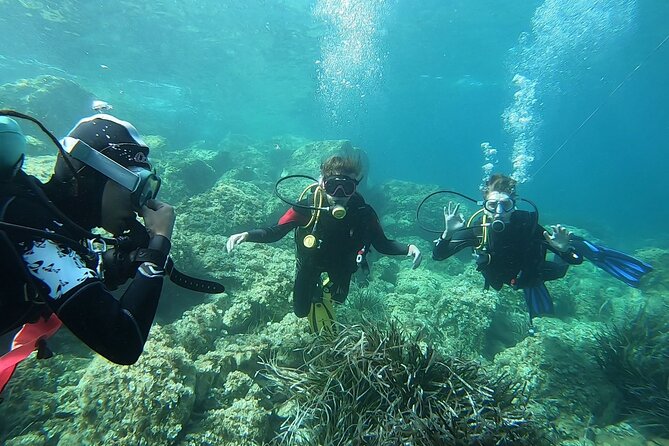 "Baptism of the Sea: Diving on the Island of Elba" - A dinghy ride shaped by the weather