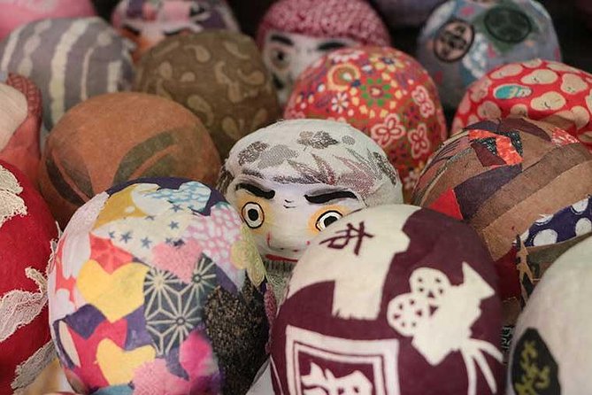 Deep Dive into the World of Daruma Dolls - Tea, games, and Daruma senbei while the glue dries