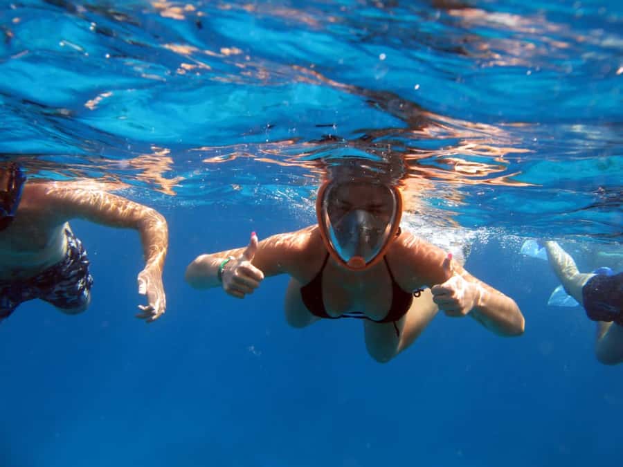Hurghada: Orange Bay Snorkeling cruise and optional diving - Lunch, drinks, and the practical comfort of a staffed boat
