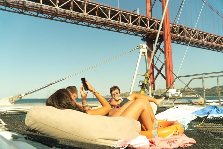 Lisbon: Catamaran Boat Party with Music, Open Bar & Dives - What this catamaran party is really like