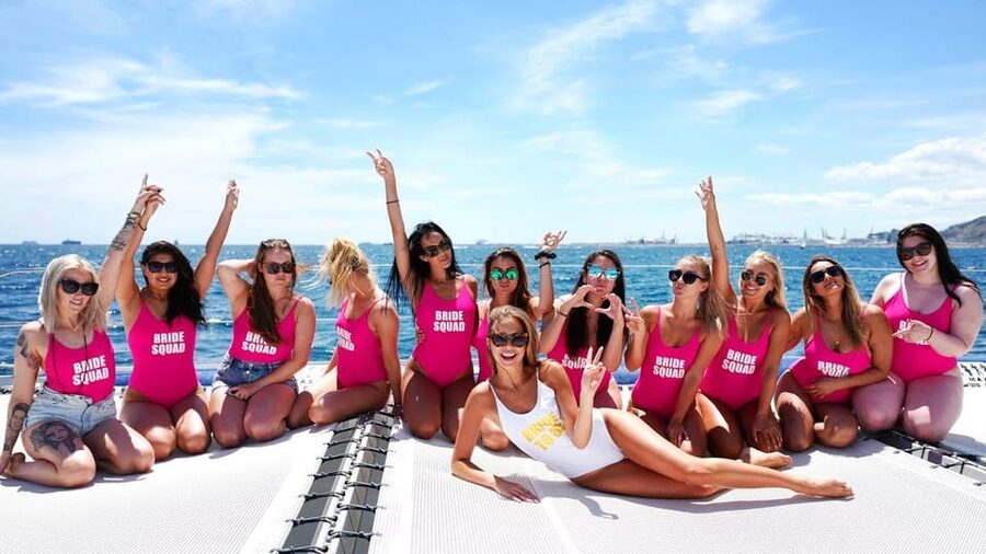 Lisbon: Catamaran Boat Party with Music, Open Bar & Dives - Cruising toward Algés