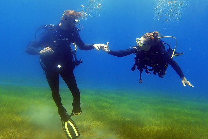 Tenerife Under The Sea - dive into 1-1 personalised experience - Entering from the beach at Avenida Maritima